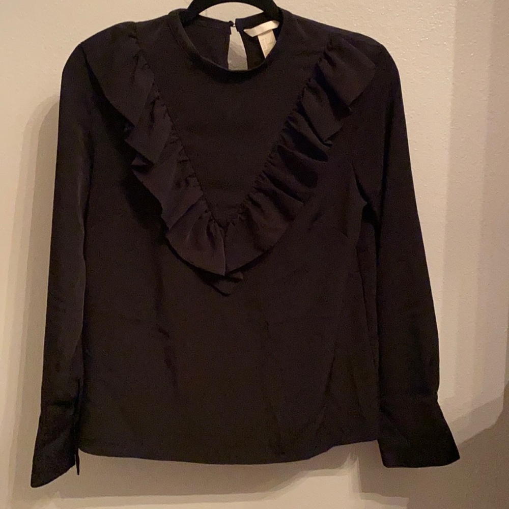 Black top with ruffle